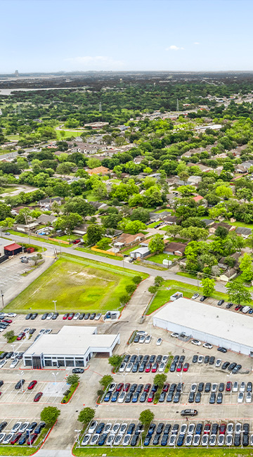 League City campus aerial view showing building and parking lot