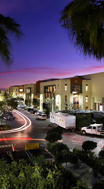 Manhattan Beach Studios with busy activity at night