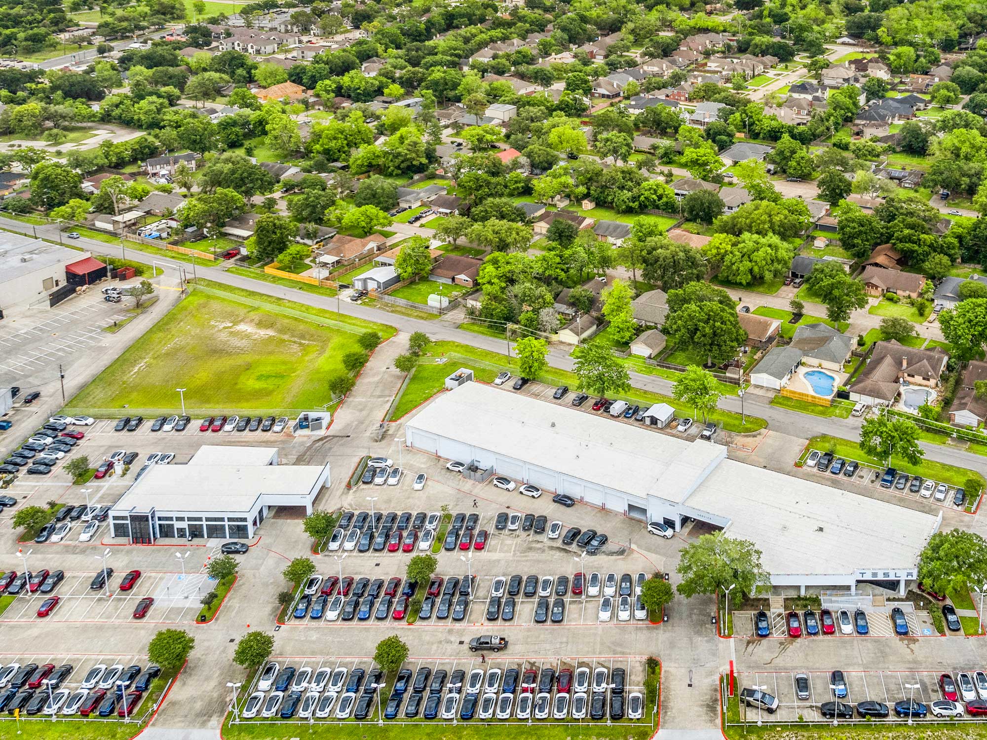League City campus aerial view showing building and parking lot